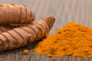 Raw and ground turmeric,