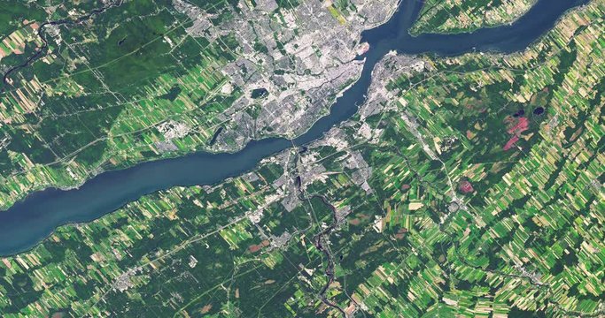 Very high-altitude overflight aerial of Quebec City, Canada. Clip loops and is reversible. Elements of this image furnished by USGS/NASA Landsat