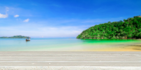 table with beach blurred