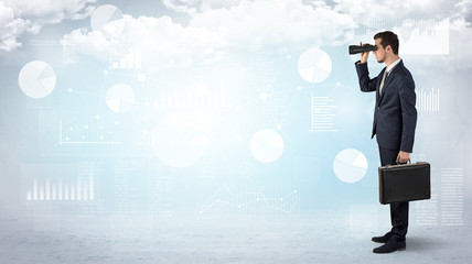 Businessman  looking forward with binoculars