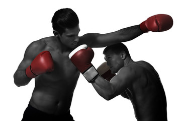 Fototapeta na wymiar Young boxers fighting on white background