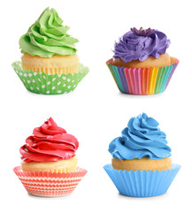 Set of tasty colorful cupcakes on white background