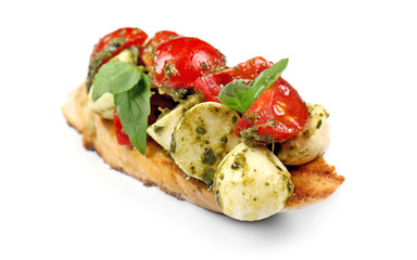 Tasty fresh bruschetta on white background