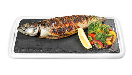 Slate plate with tasty grilled fish on white background