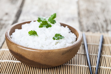 Boiled rice in a wooden bowl