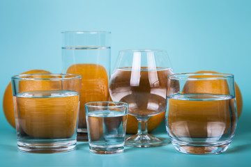 Transparent water in different glasses