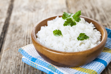 Boiled rice in a wooden bowl