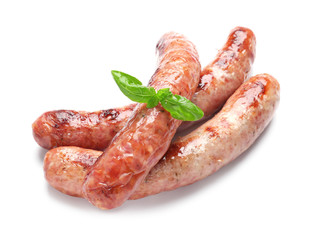 Delicious grilled sausages on white background