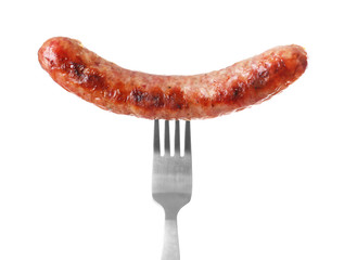 Fork with delicious grilled sausage on white background