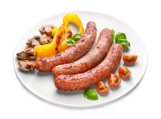 Plate with delicious grilled sausages and vegetables on white background