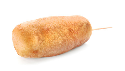 Tasty corn dog on white background