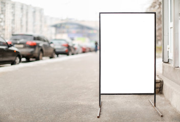 Advertising board on city street