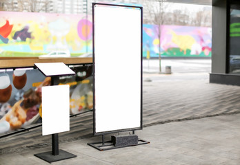 Advertising board on city street