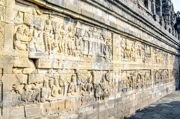 Decorated stone with bas reliefs in the Borobudur temple in Yogyakarta, Java, Indonesia.