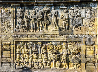Decorated stone with bas reliefs in the Borobudur temple in Yogyakarta, Java, Indonesia.