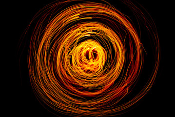 Orange Color Light Painting Photography Over Black Background