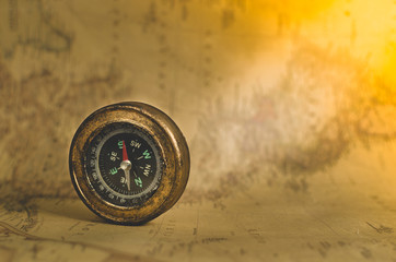 Compass on the background of old maps © freeman83