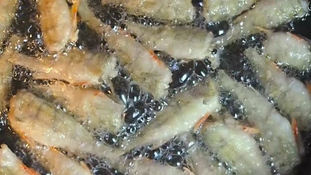 Fish perch fried in fresh oil. Natural food of the animals. Preparation  Frying of fish dishes. 