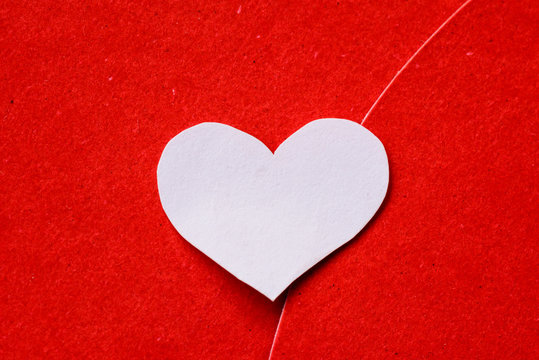 Big red and white heart paper on red paper background. valentines day concept.