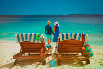 happy couple relax on a tropical beach