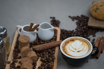 Morning coffee,Latte coffee in cup on table,vintage tone.
