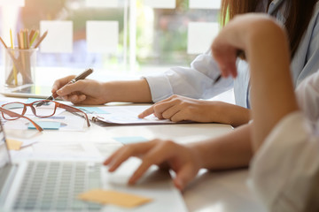 Businesswoman working with document paper consult business, selective focus.