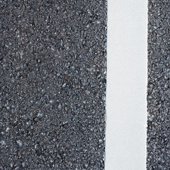 Asphalt road, white line on the new road