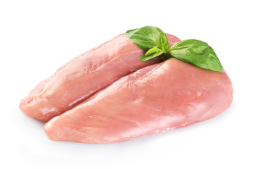 Raw chicken breast and basil isolated on white background.