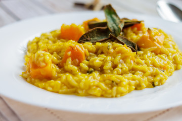 Risotto with red crab on a white plate