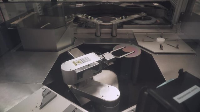 Innovative laboratory, automatic machine produces polishing of silicon wafers.
