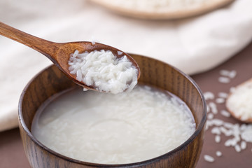Chinese traditional fermented glutinous rice wine (sweet rice wine), closeup.