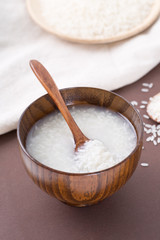 Chinese traditional fermented glutinous rice wine (sweet rice wine), closeup.