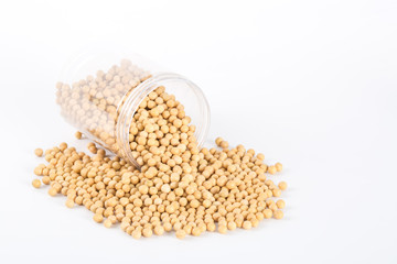 Soybean in bottle on white background
