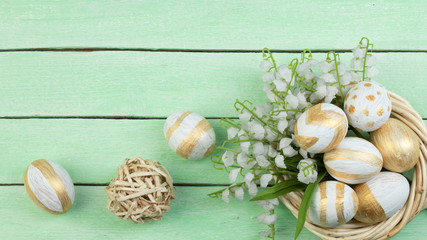 Happy Easter. eggs isolated on wooden table background.. Balls, wreath woven from the vines. Copy space for text. Top view.