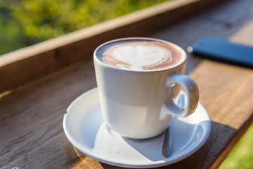 coffee cup on a wooden table