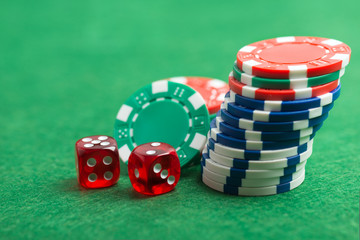 casino chips and red dice