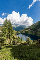 Fototapeta na wymiar Adamello with Camp Lake (Lago di Campo) - Trento Italy 