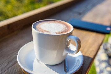coffee cup on a wooden table