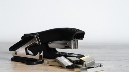 Stapler for office work on the table. Stationery item. Office su