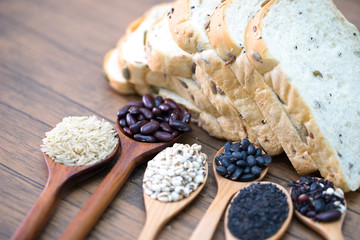 Obraz na płótnie Canvas Black beans, red beans, black sesame, rice and cereals,bread