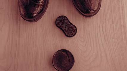 Shoes and scouring cream on the floor. Clean shoes for walking. 