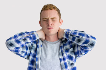 Upset Red Haired Guy Feeling Neck Pain