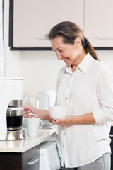 woman preparing coffee