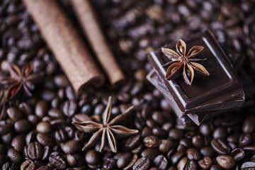 Defocused coffee, chocolate and cinnamon