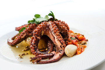 Mediterranean Octopus with vegetables and potatoes