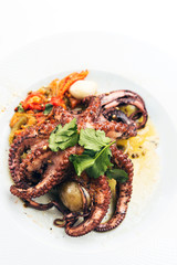 Mediterranean Octopus with vegetables and potatoes