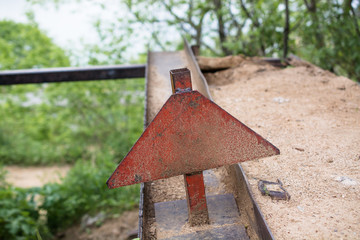 Wheel limiter on the car service pit.