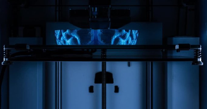 3d printer printing human brain model, symbolising artificial intelligence