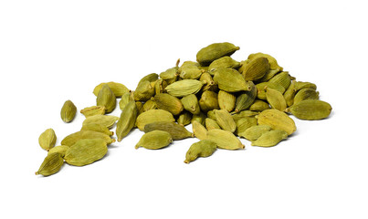 Fruits of cardamom isolated on white background. A lot of cardamom grains