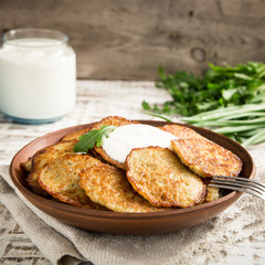 Draniki - potato fritters. potato pancakes. The naitonal dish of Belarus, Ukraine and Russia.
